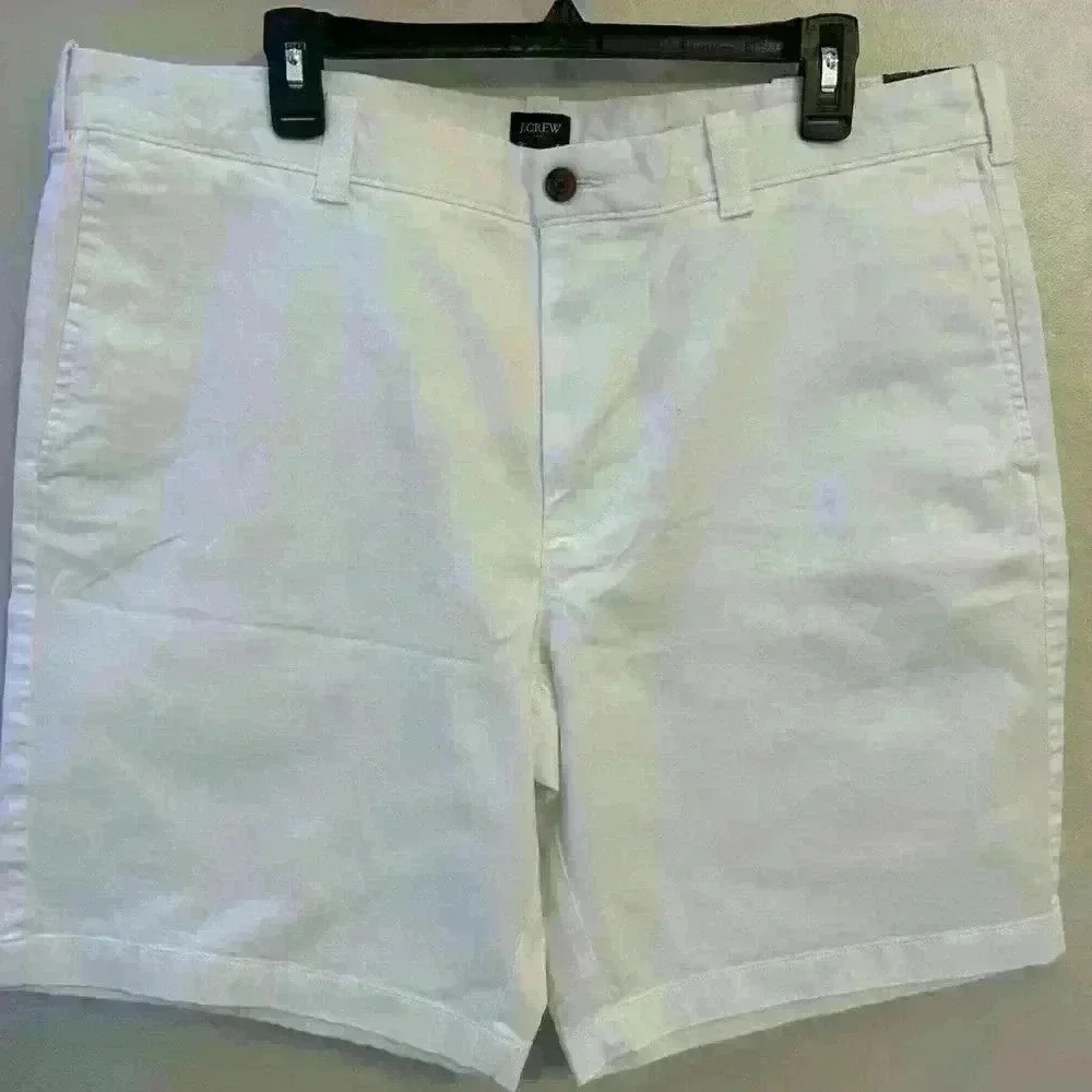 Men's JCrew white flat front shorts.  Size 38 with a 9inch inseam. NWT